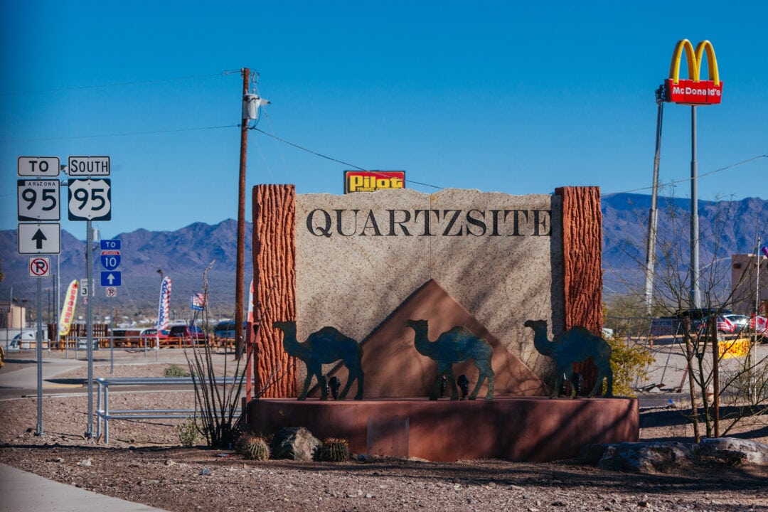 A sign depicted desert scenery welcomes visitors to the town of Quartzsite, Arizona.